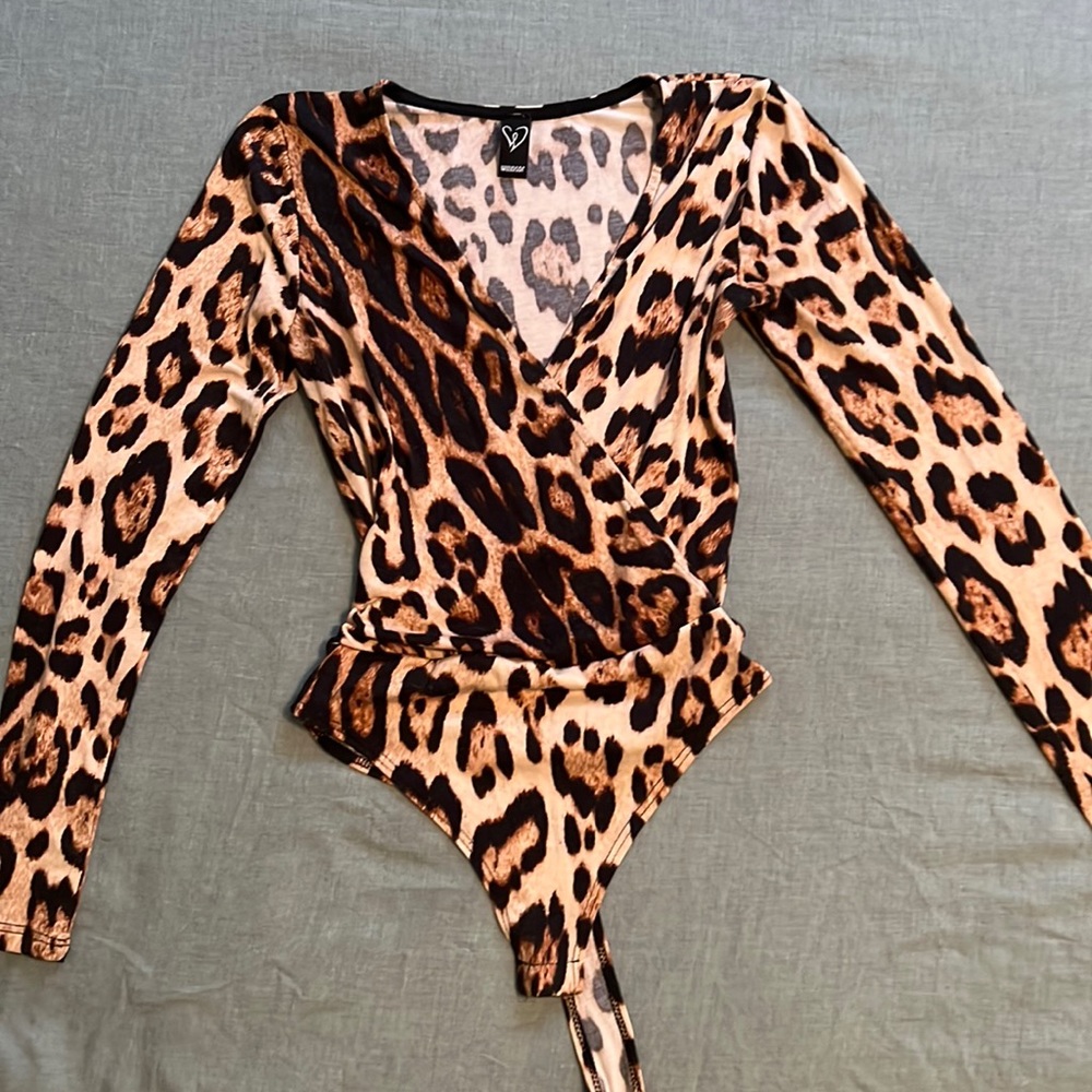 Long sleeve leopard print bodysuit. Windsor - size xsmall - gently used.
